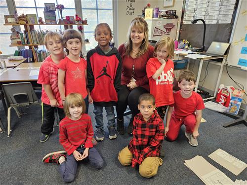 classroom of students wearing red